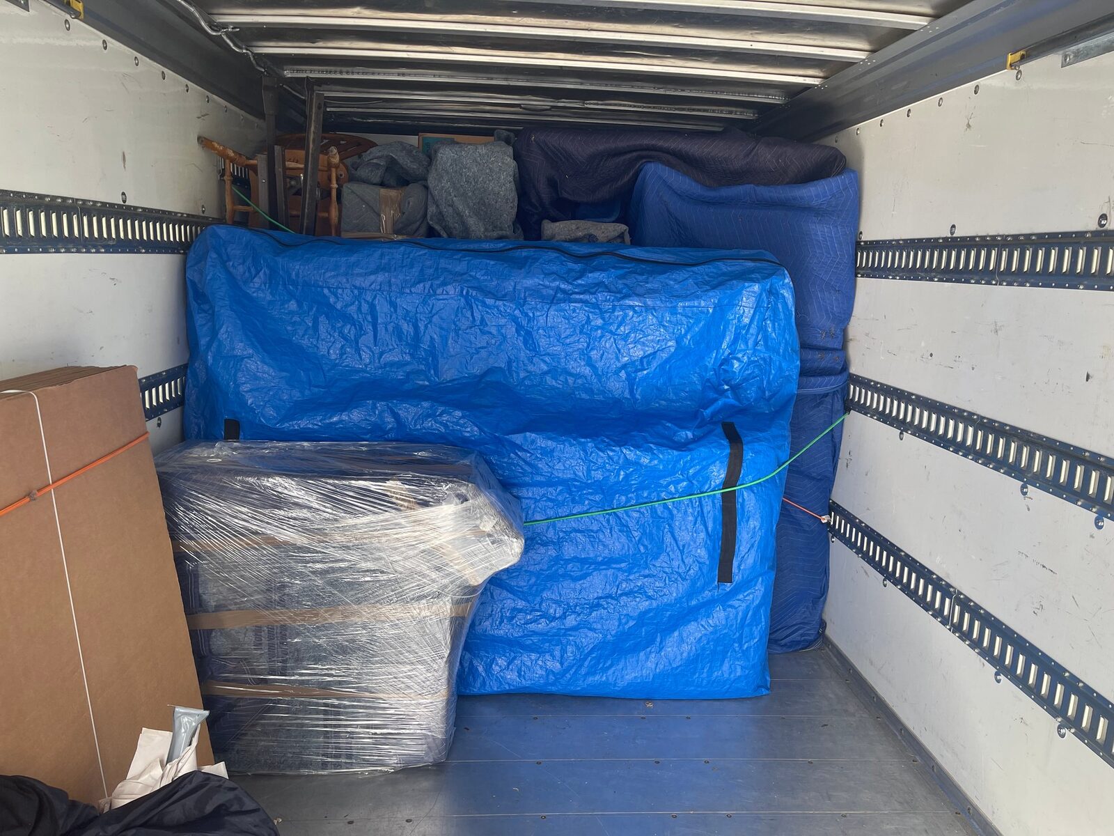 Furniture padded and secured inside the Royalty moving truck
